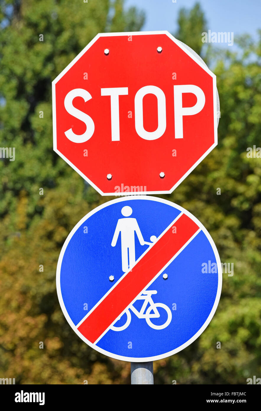 Yellow triangle road sign bicycle hires stock photography and images