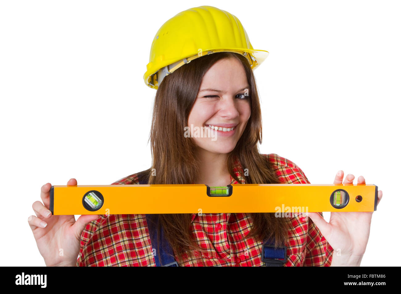 Craftswoman with water level Stock Photo