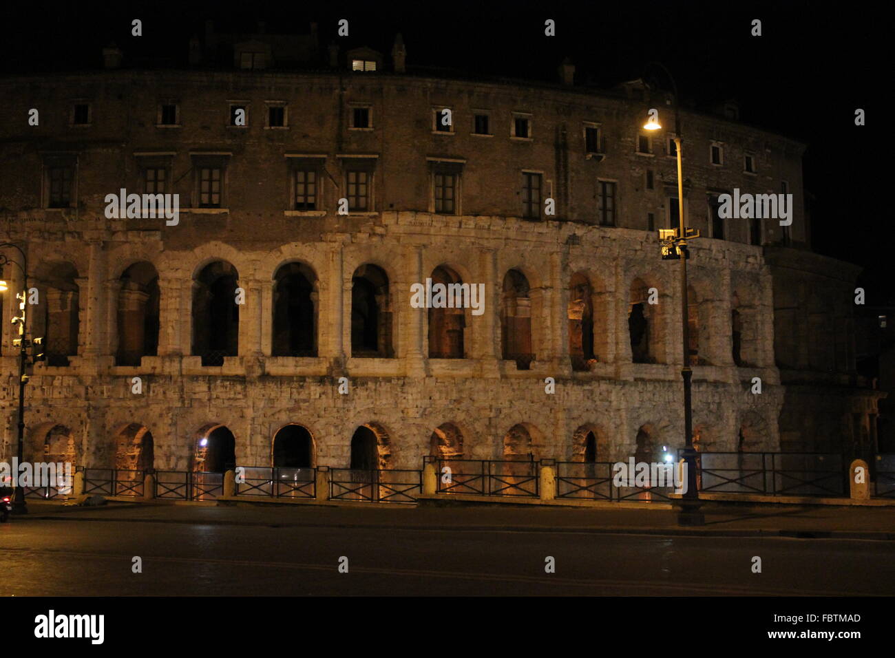 ROME, ITALY - DECEMBER 30 2014: The Theatre of Marcellus ( Italian: Teatro di Marcello)  ancient building at night in Rome, view Stock Photo