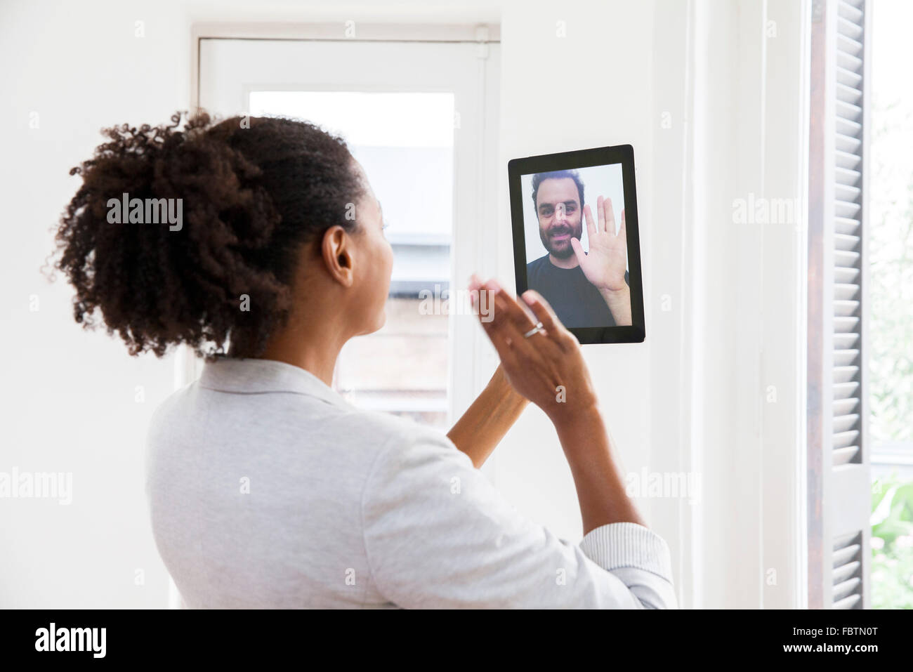Couple doing video chat Stock Photo