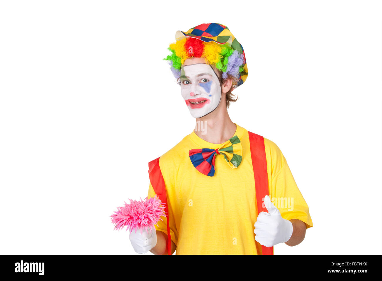 Clown with pink flower Stock Photo - Alamy