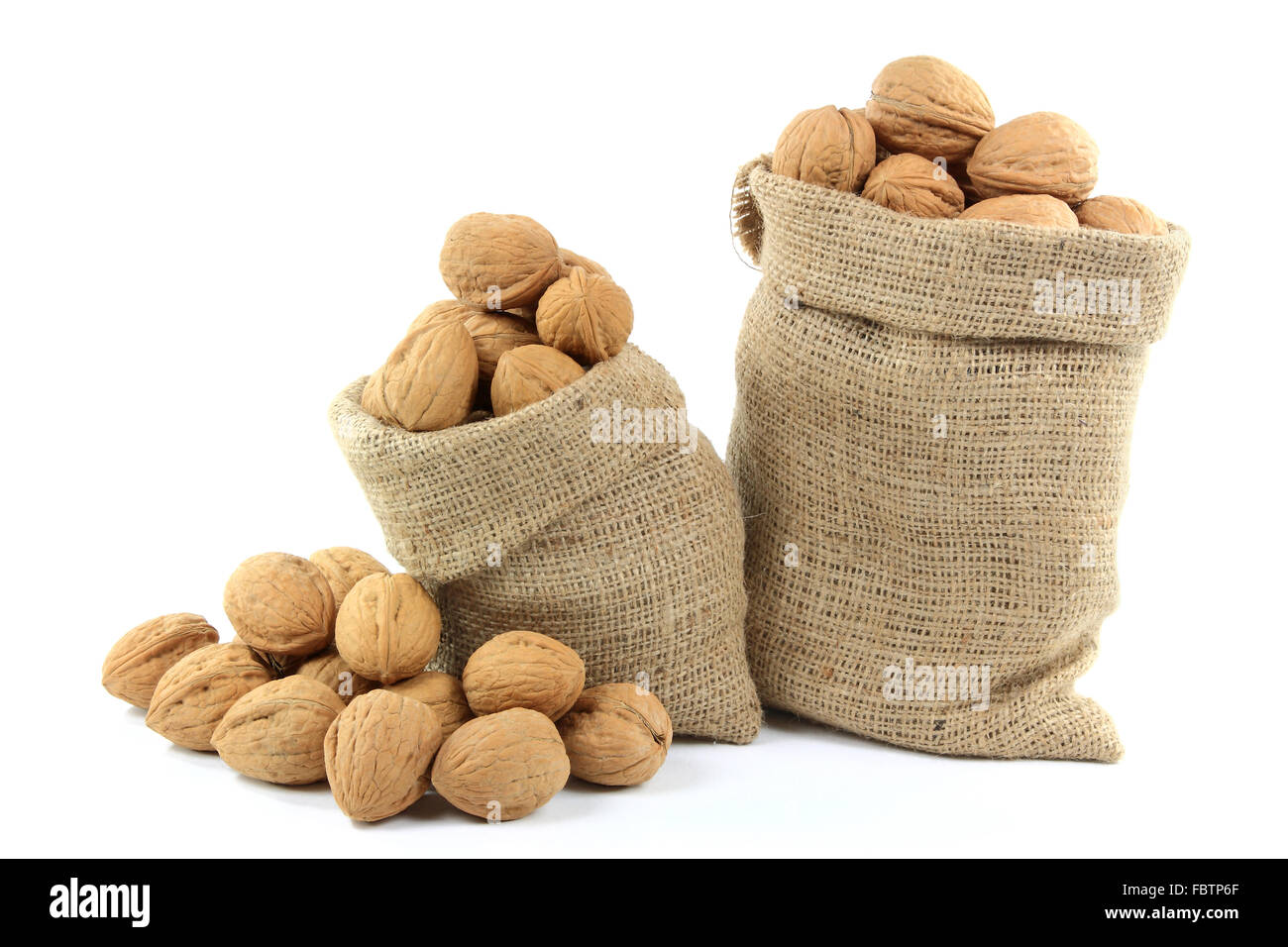 Unshelled Walnuts  Nuts. Stock Photo