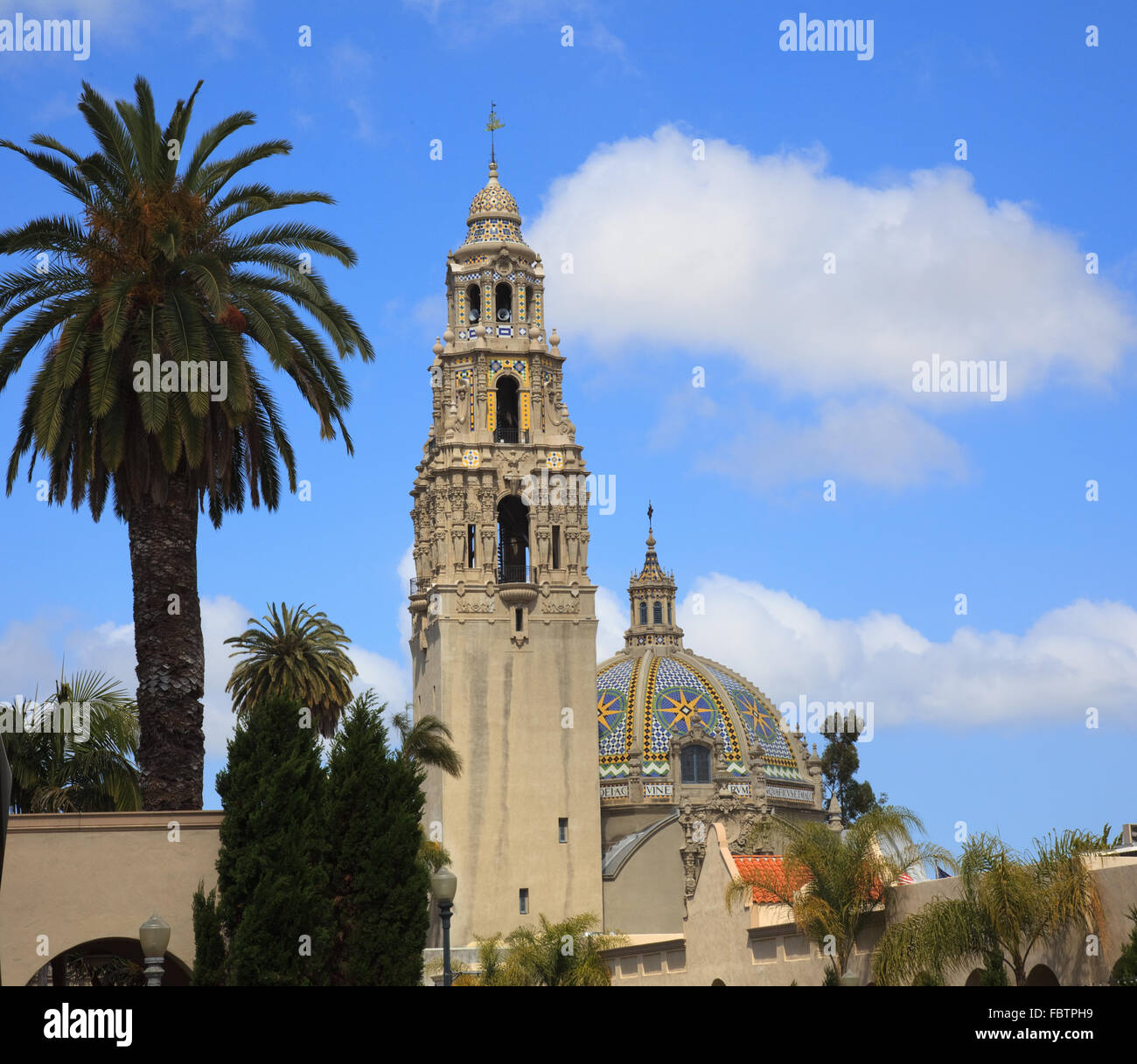 View of the ornate California Tower from the Alcazar Gardens in Balboa Park in San Diego with ornate dome Stock Photo