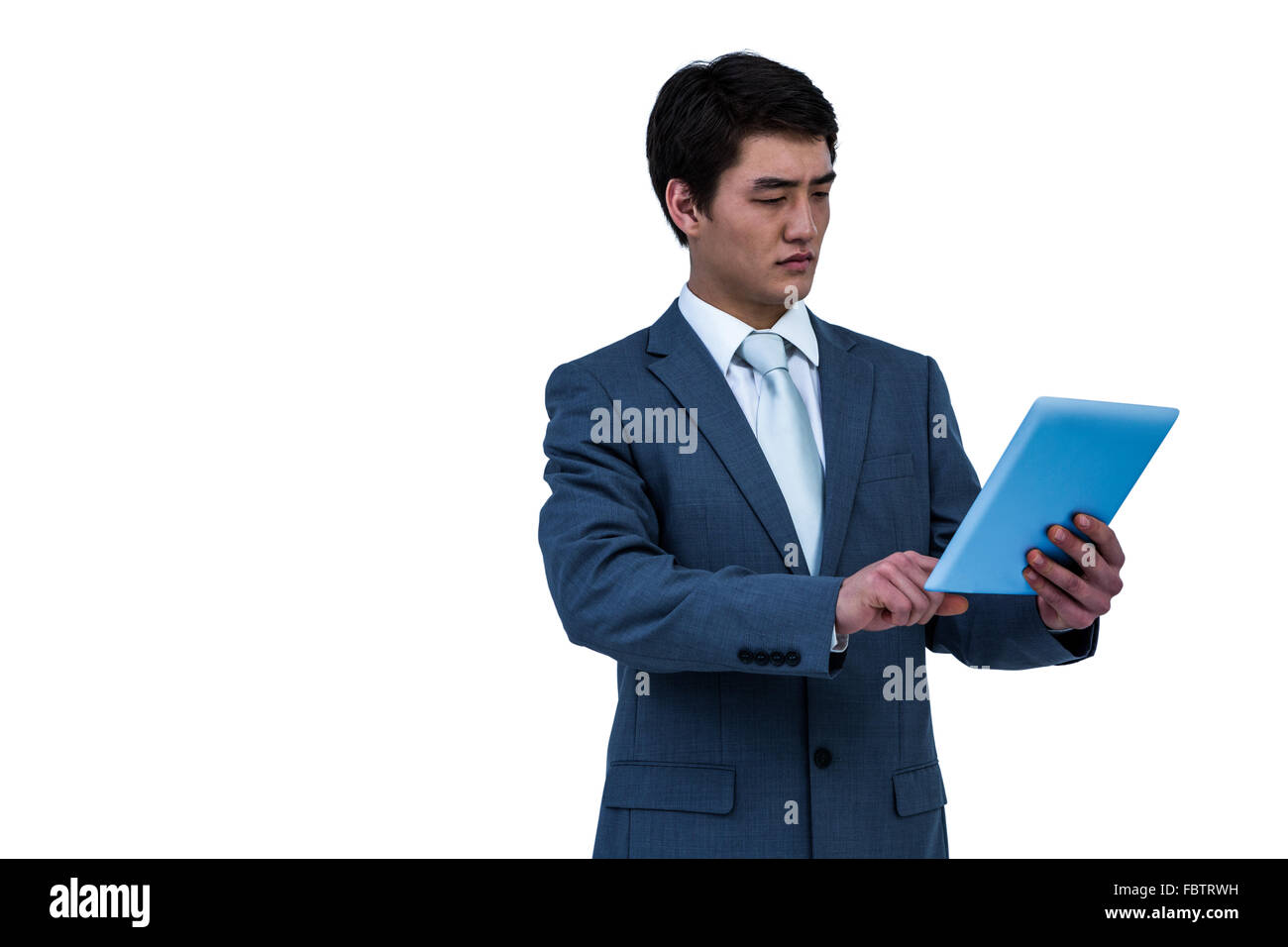 Businessman using his tablet Stock Photo