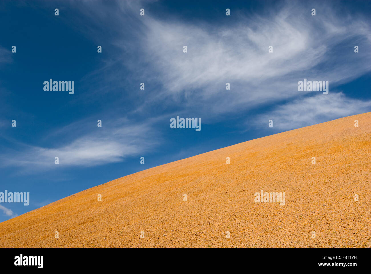 desert landscape white clouds and deep blue sky Stock Photo