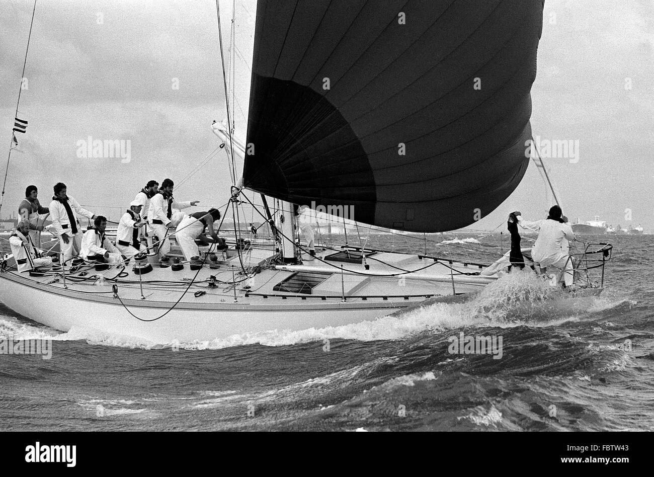 AJAXNETPHOTO. 1979. SOLENT, ENGLAND. - ADMIRAL'S CUP SOLENT INSHORE RACE - MORNING CLOUD, WITH OWEN PARKER IN THE AFTERGUARD. PHOTO:JONATHAN EASTLAND/AJAX REF:79 2034 Stock Photo