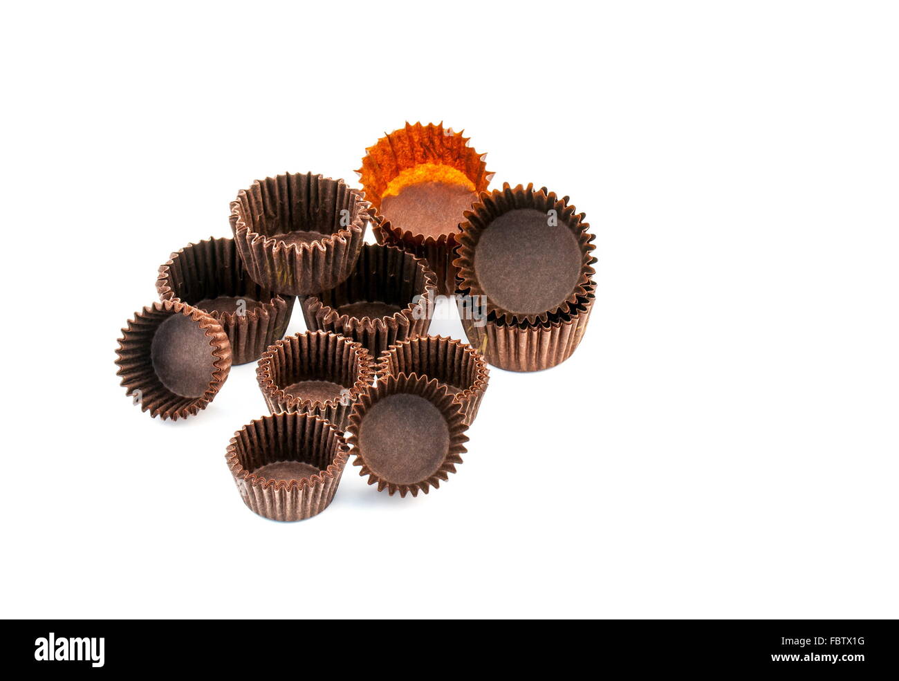 Brown chocolate rounded baking paper cups Stock Photo - Alamy