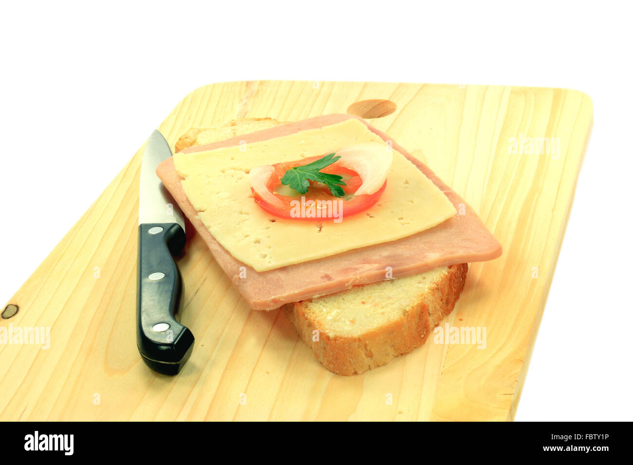 Simple Sandwich over wooden serviette. Stock Photo