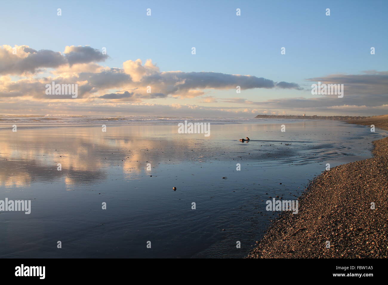 Cloud reflection, Greymouth, New Zealand Stock Photo