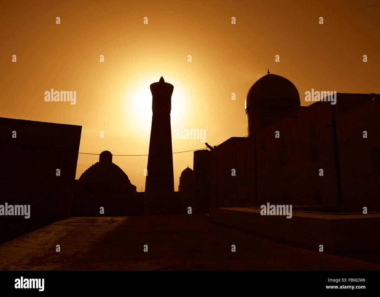 Sunset over ancient city of Bukhara, Uzbekistan Stock Photo