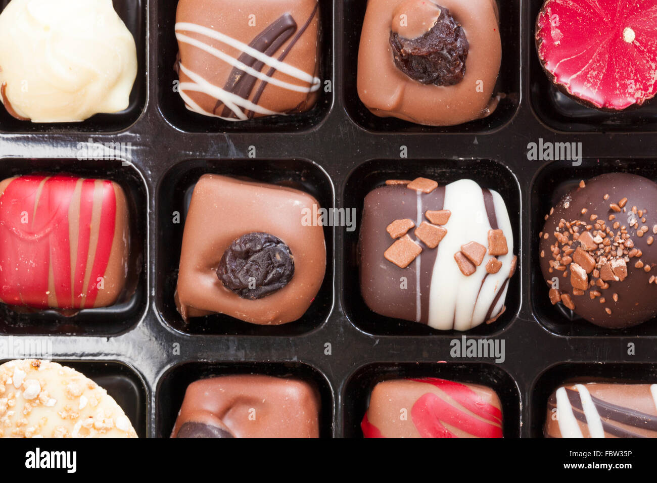 Opened box of Linden Lady luxury handmade chocolates showing contents Stock Photo