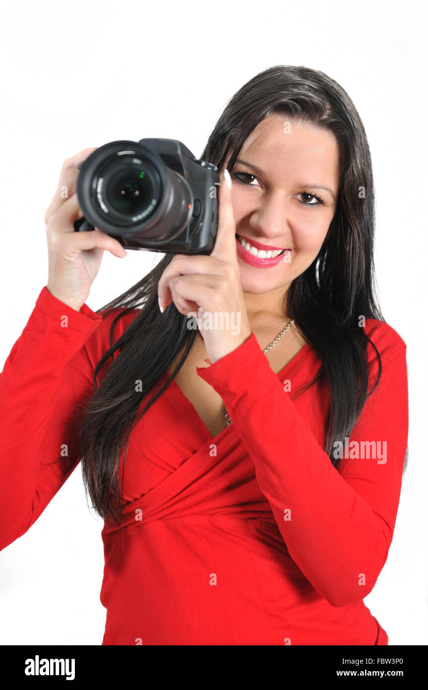 Young woman holding camera in hand taking picture isolated Stock Photo ...