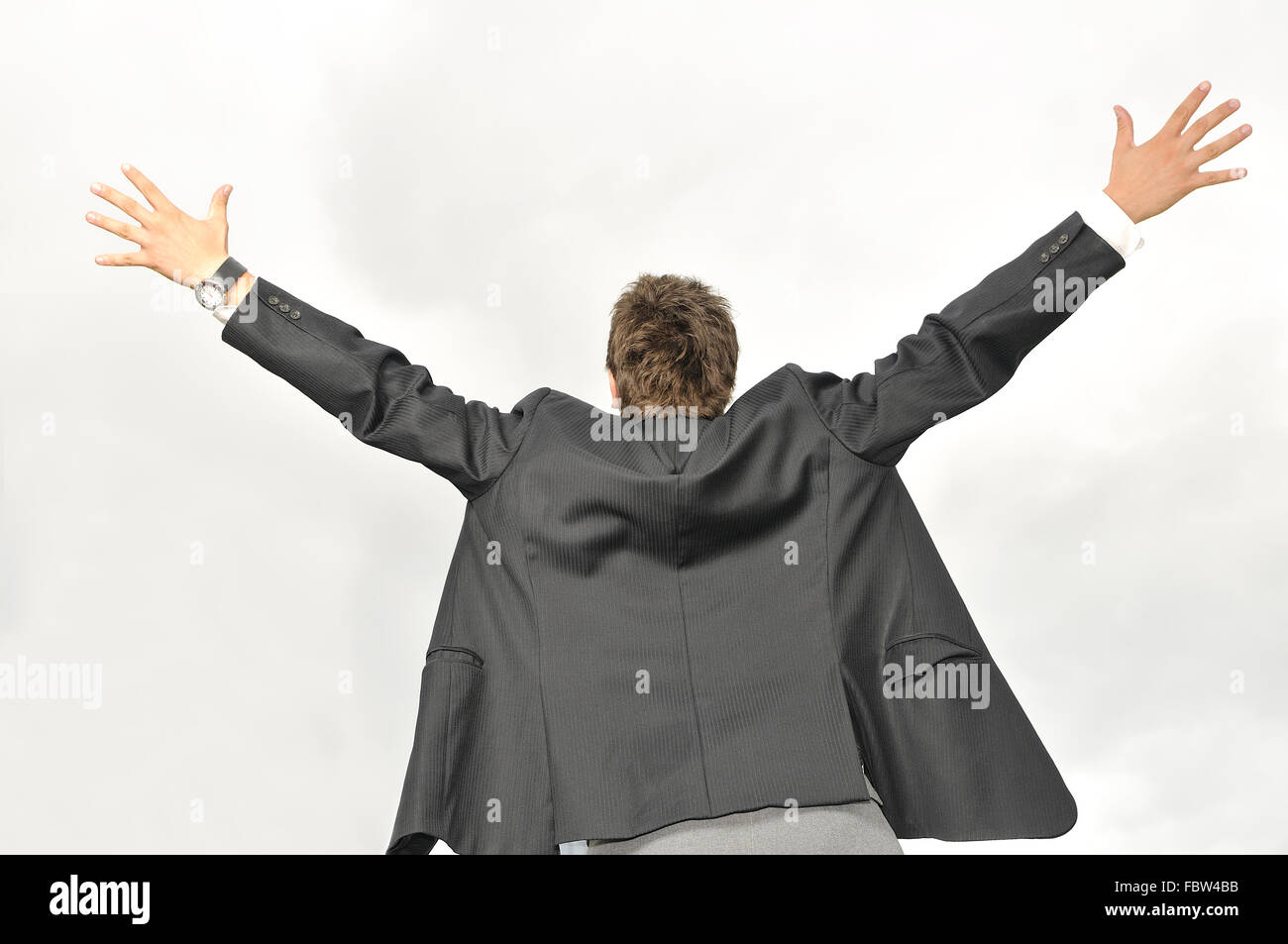 Outdoor portrait of young and happy businessman Stock Photo - Alamy