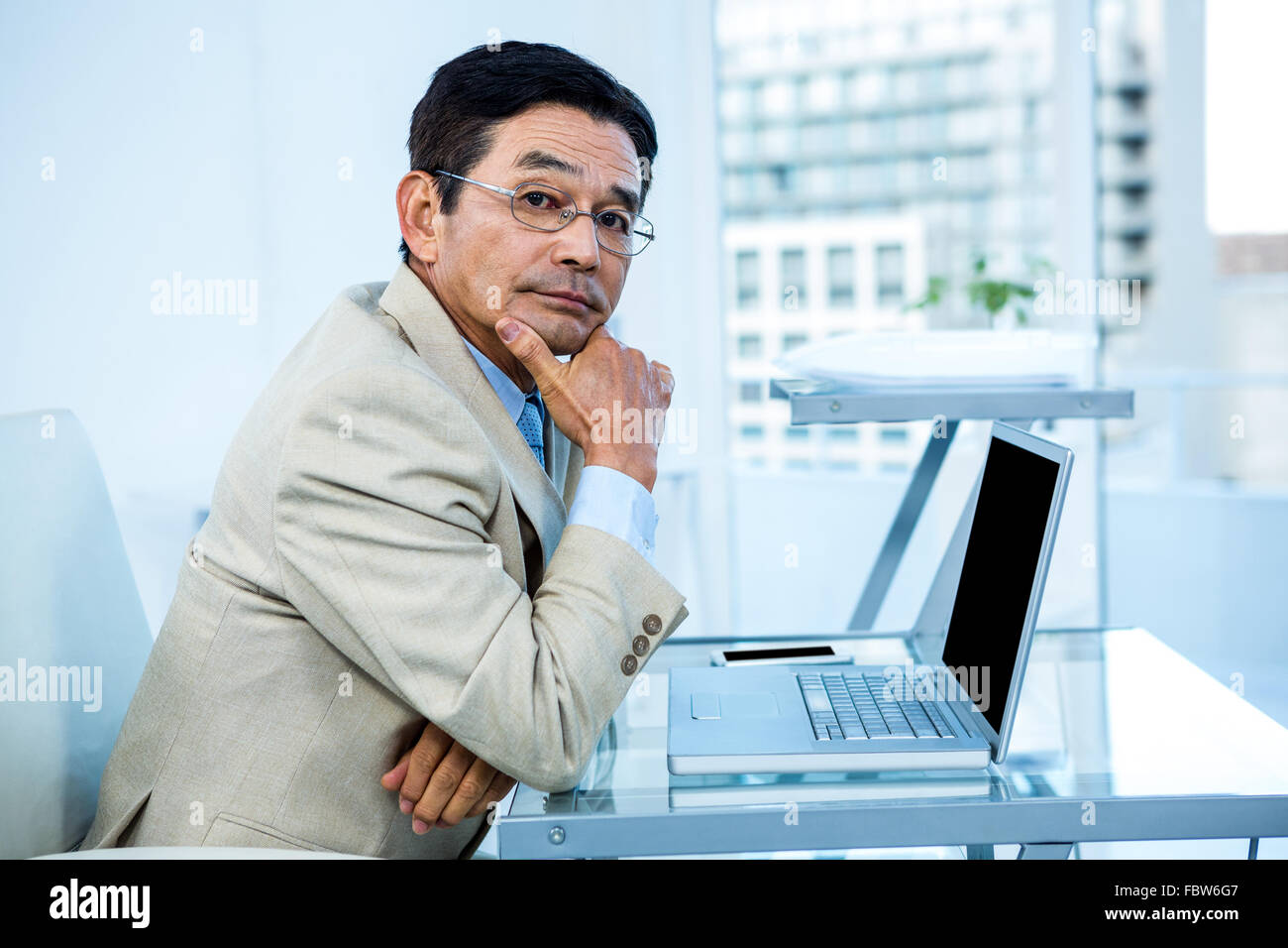 Serious senior businessman showing hi-res stock photography and images ...