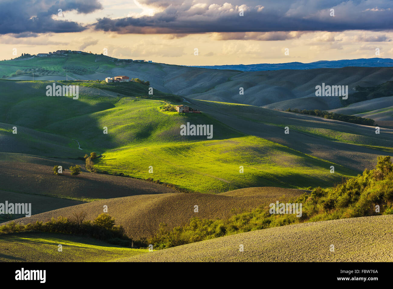 Fantastic sunny fall field in Italy, tuscany landscape. Stock Photo