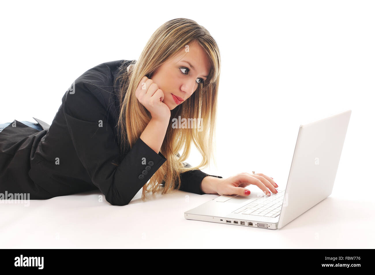 one young girl work on laptop isolated on white Stock Photo - Alamy