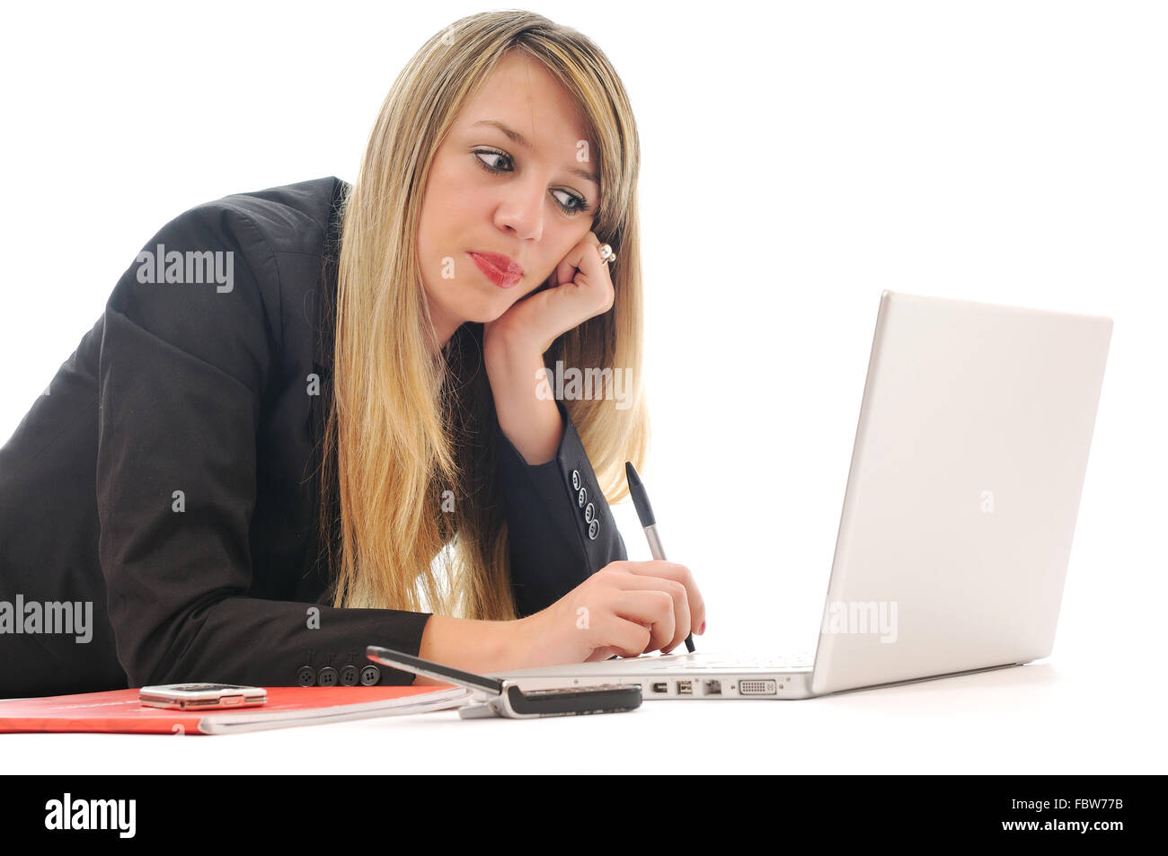 one young girl work on laptop isolated on white Stock Photo - Alamy