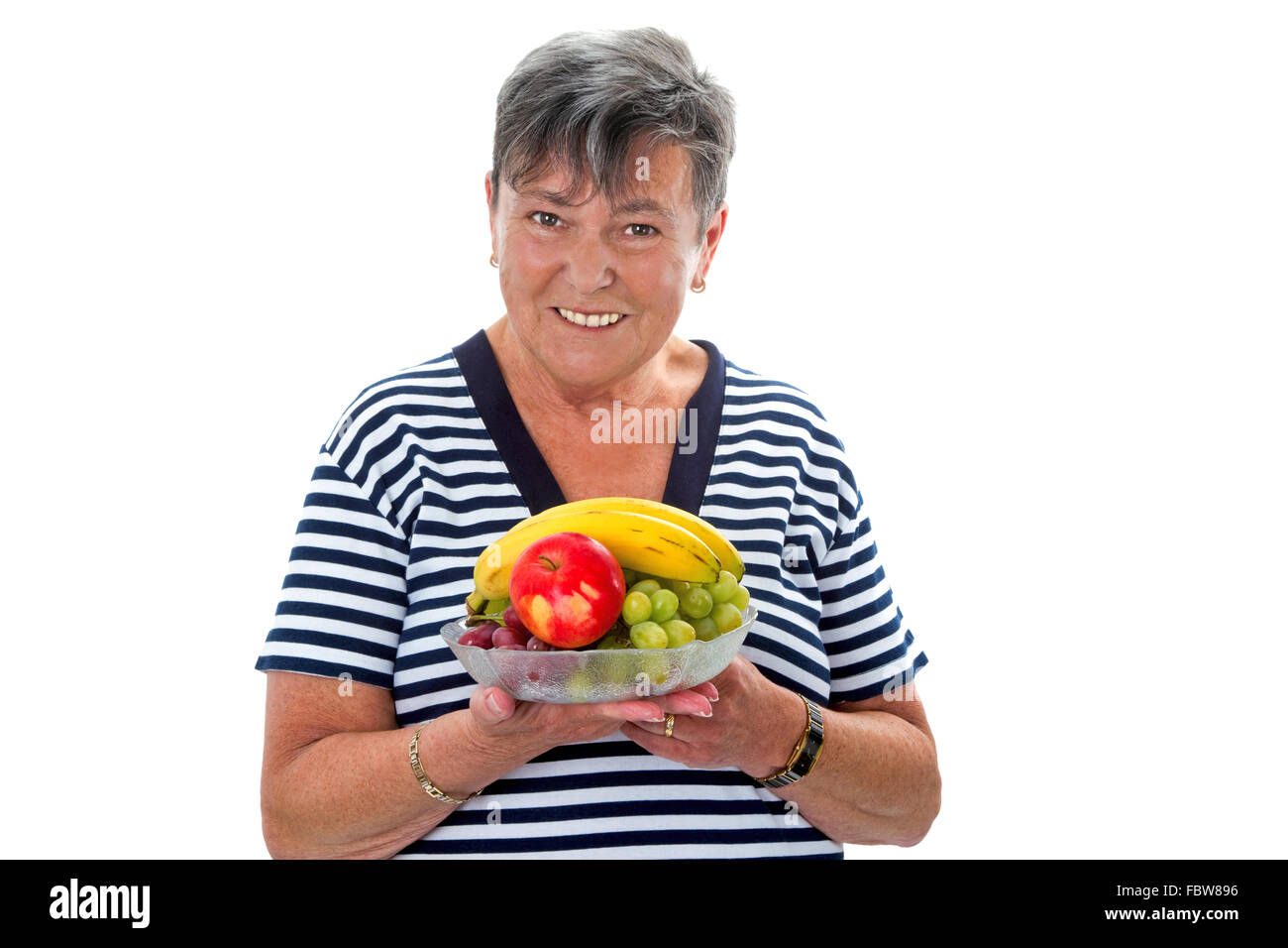 Senior woman with fruit Stock Photo - Alamy