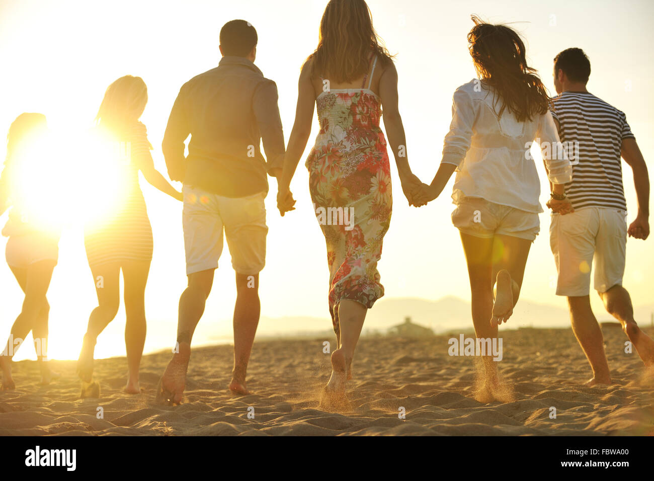 Diverse group joyful young people hi-res stock photography and images ...