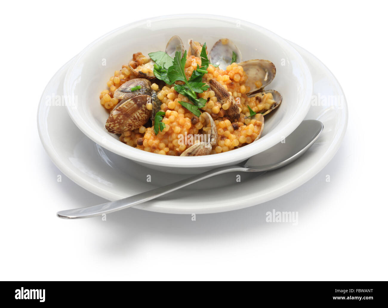 sardinian pasta with clams, italian cuisine, fregula con vongole, fregola con arselle Stock Photo