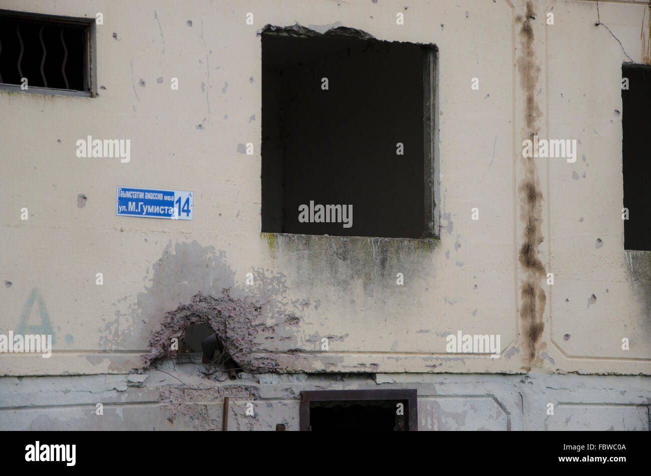 Shell damage. Apartment building. Sukhumi, Abkhazia Stock Photo - Alamy