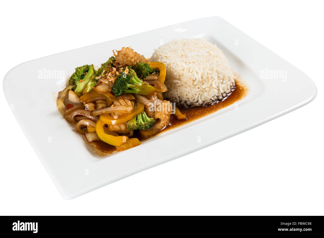 Classic Chinese Food on a plate with vegetable and rice. Background isolated white. Asia Food with Vegetable and Rice Stock Photo