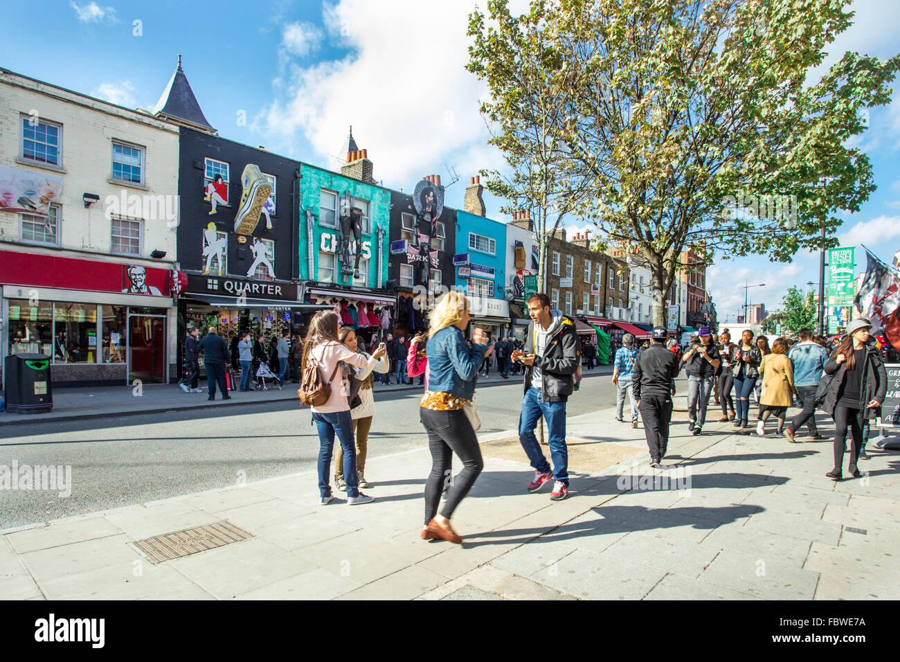 LONDON, UK - OCTOBER 10, 2014: Pictured here is a street view of historic Camden Town at the Stables with visitors visible. Stock Photo