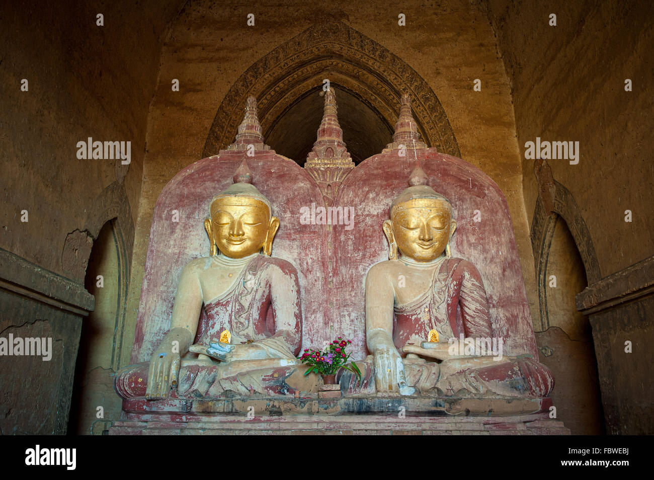 Buddha statues in the Dhammayangyi Temple, Bagan, Myanmar Stock Photo