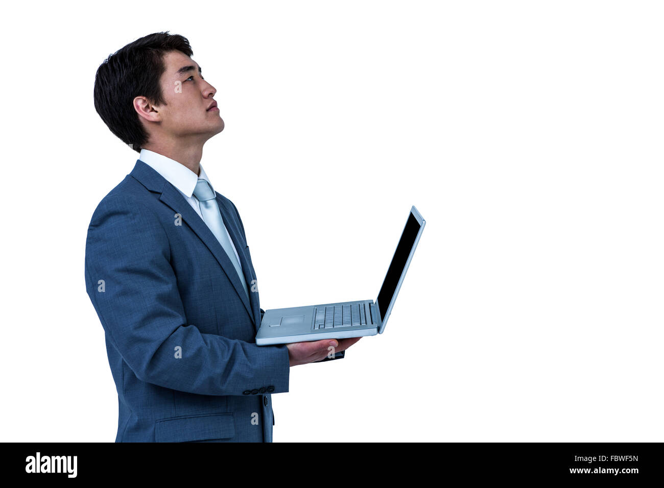 Businessman look away with his computer Stock Photo