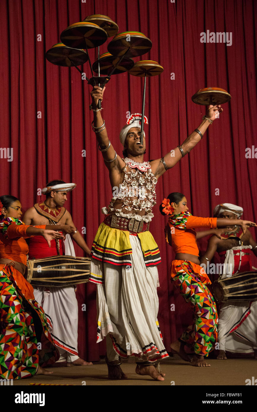 The Raban dance as part of the Kandyan dance, on stage at a YMBA ( Young Men's Buddhist Association Hall) in Ksndy, Sri Lanka Stock Photo