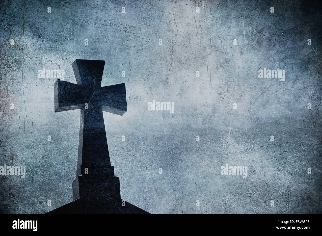 Grunge image of a cross in the cemetery, perfect halloween background Stock Photo