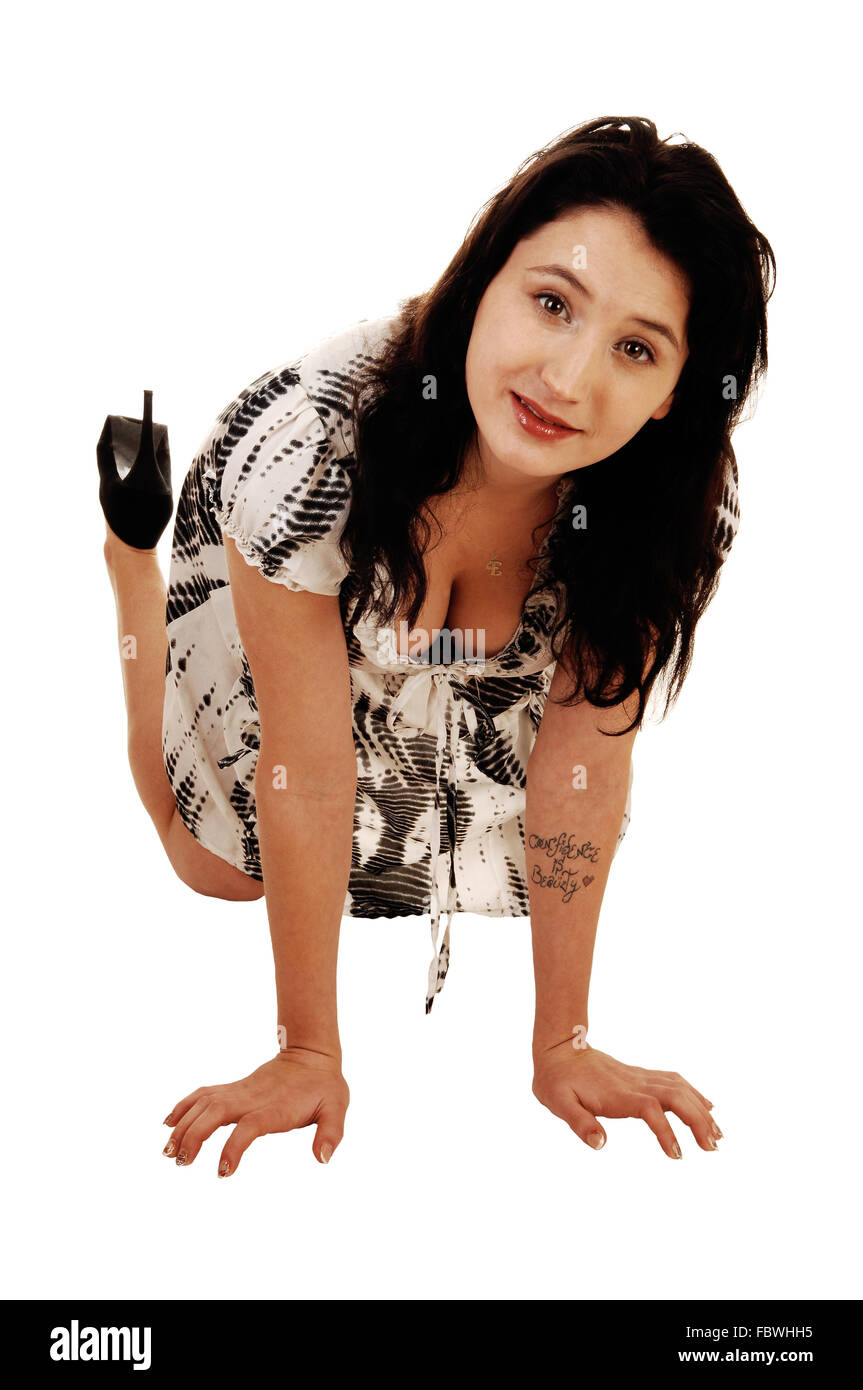 Young woman kneeling arms hi-res stock photography and images - Alamy