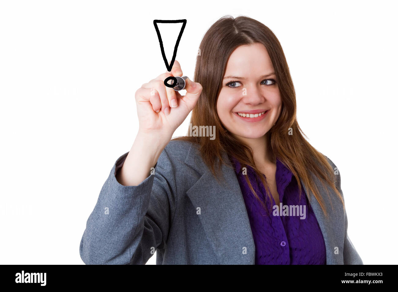 Young woman writing exclamation mark Stock Photo - Alamy