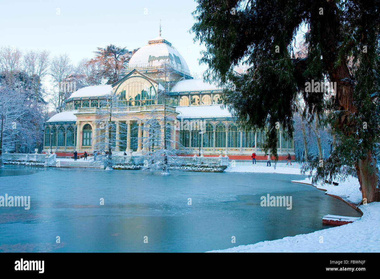 Snow covered Cristal Palace. The Retiro park, Madrid, Spain. Stock Photo