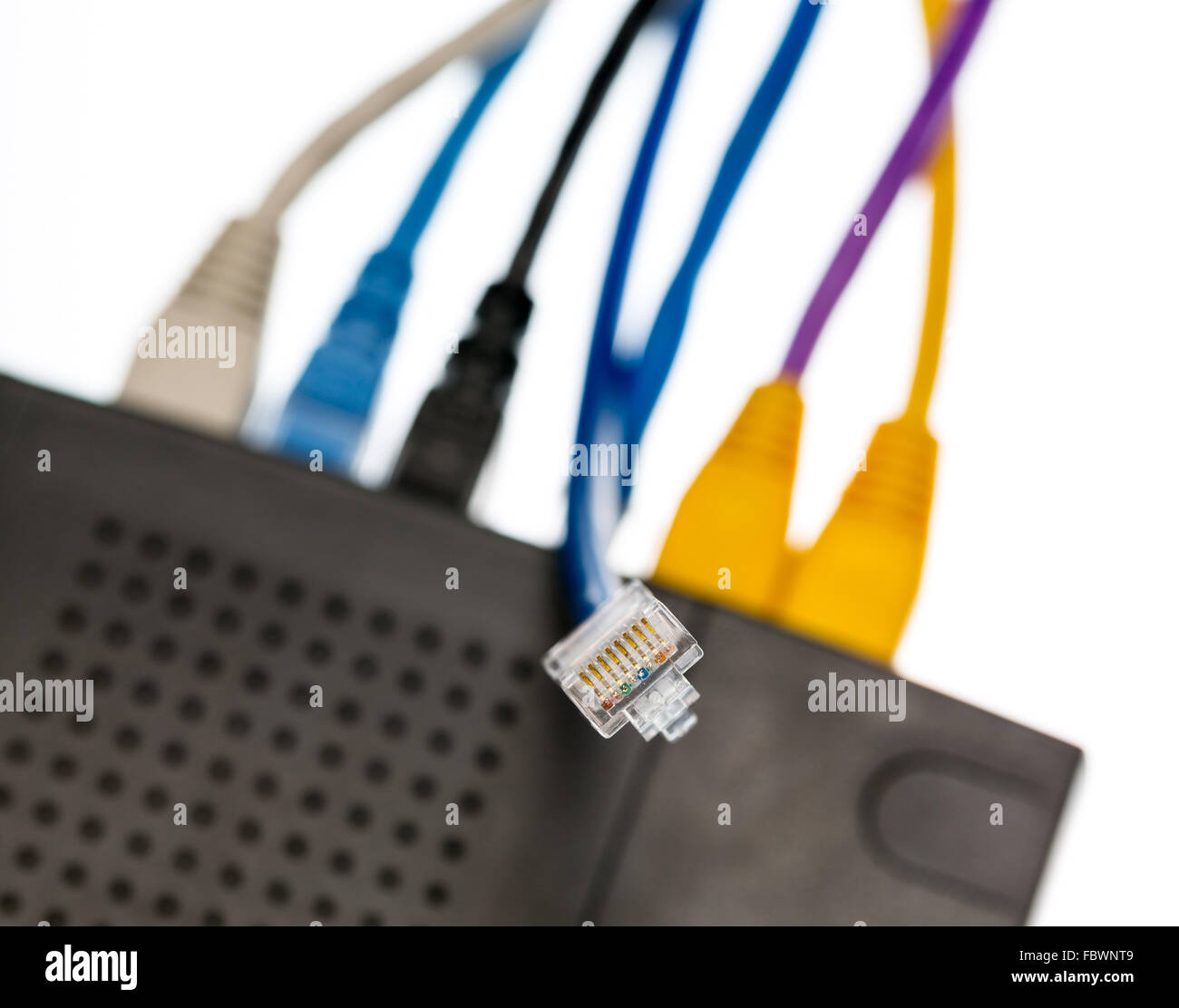 Cat5 cables and router for cyberdefence concept Stock Photo - Alamy