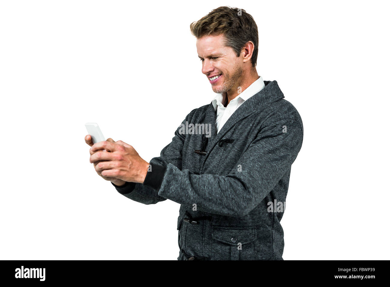 Happy man using mobile phone Stock Photo