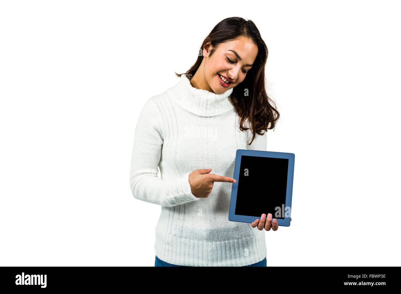 Happy young woman pointing at digital tablet Stock Photo