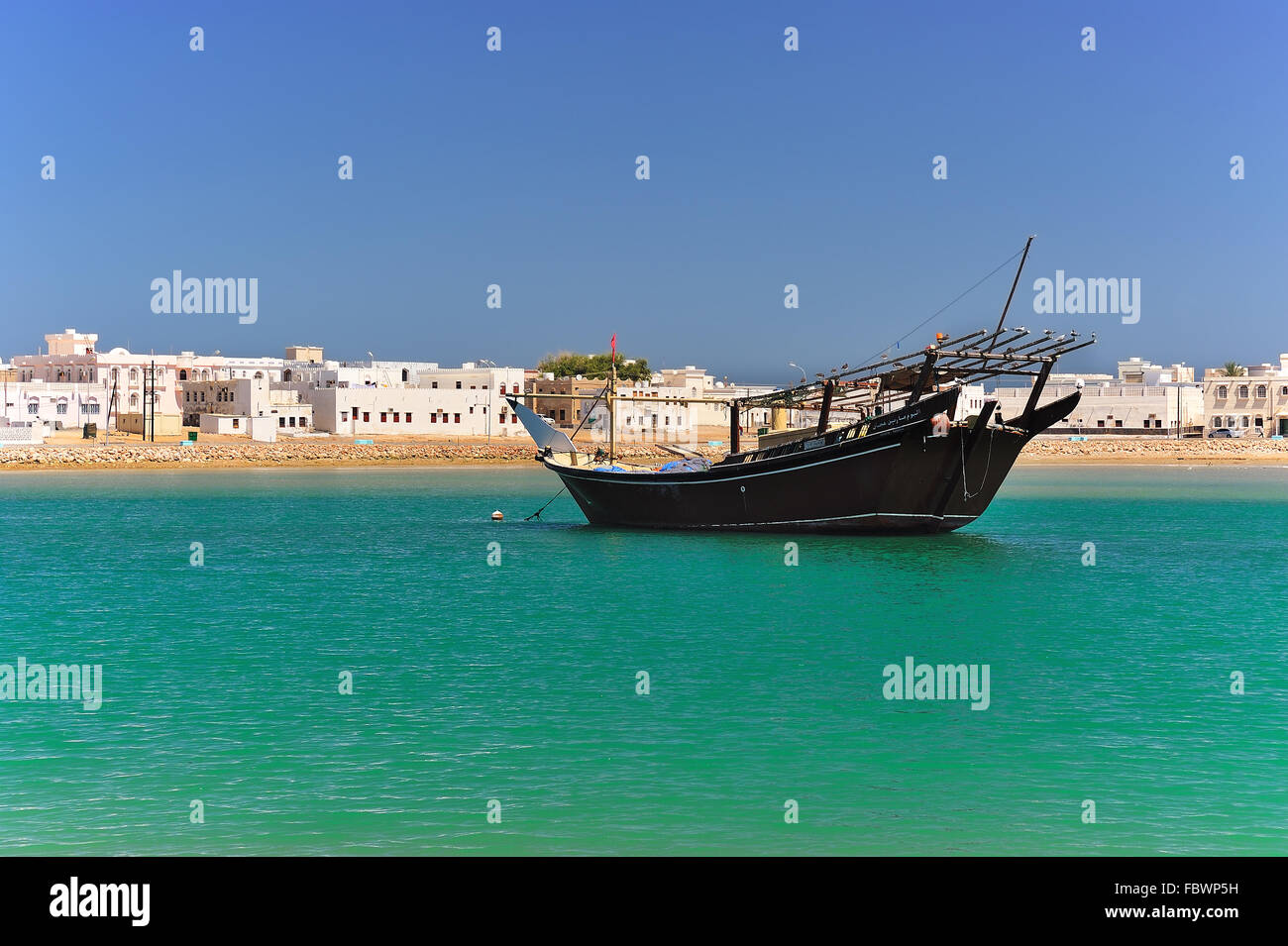 Dhow in Harbour of Sur in Oman Stock Photo
