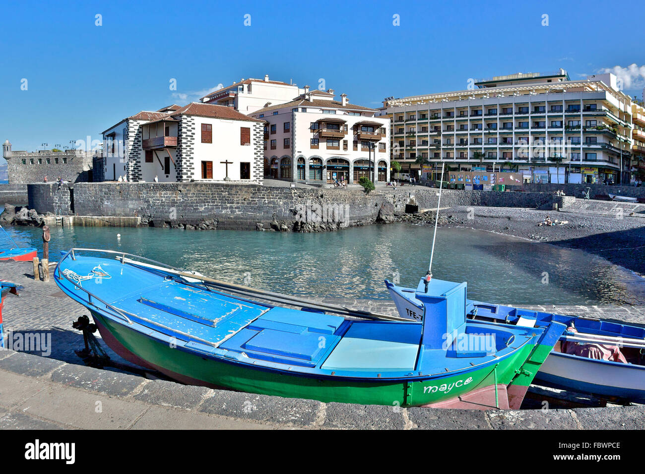 Fishing boat in the bay Stock Photo - Alamy