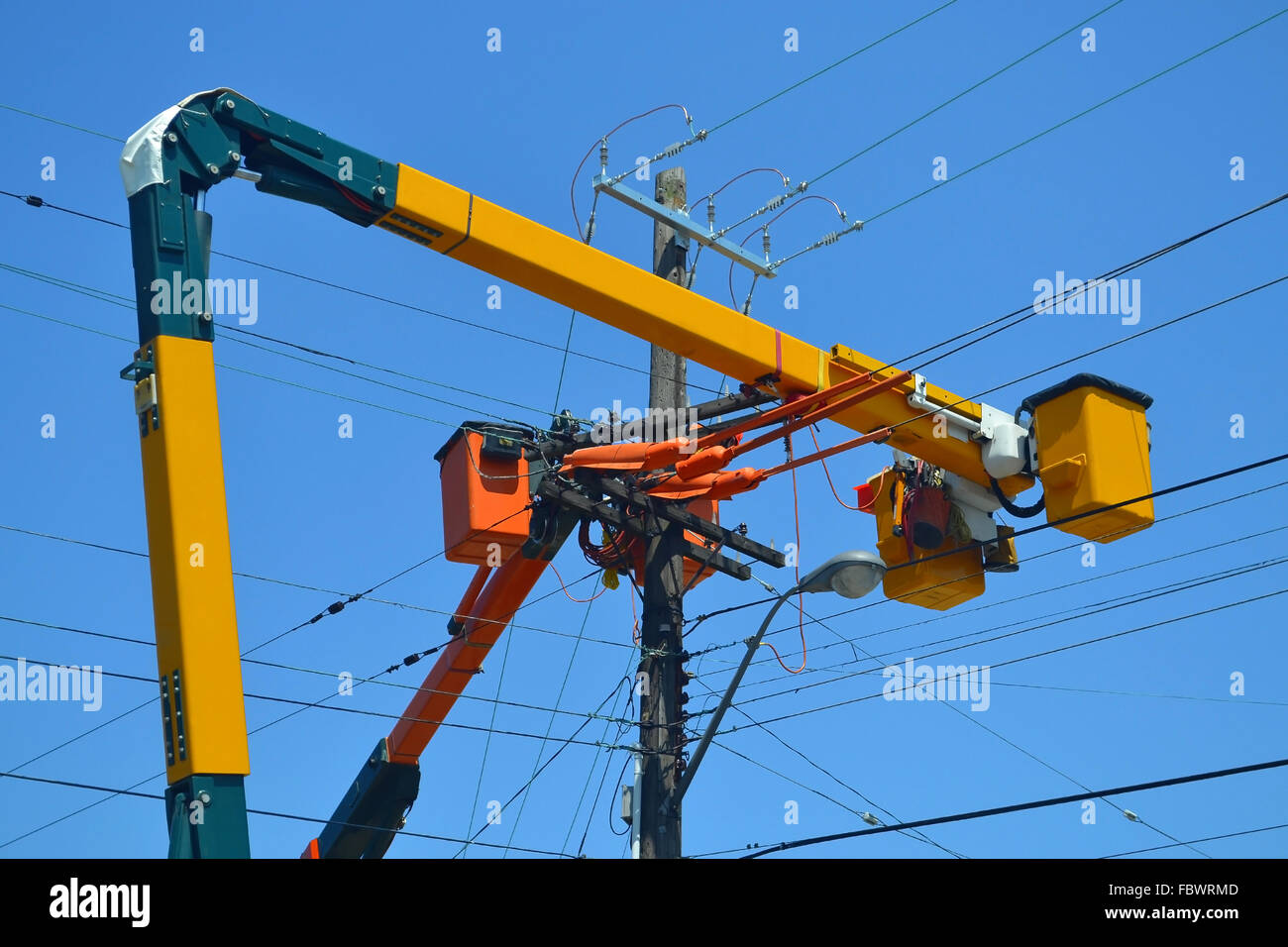 Lift trucks on power lines Stock Photo Alamy