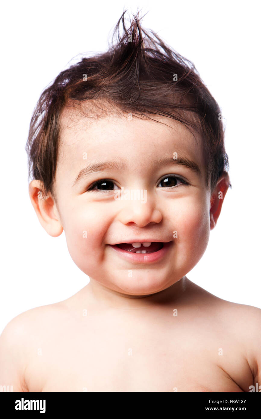 Teething baby toddler with hairstyle Stock Photo