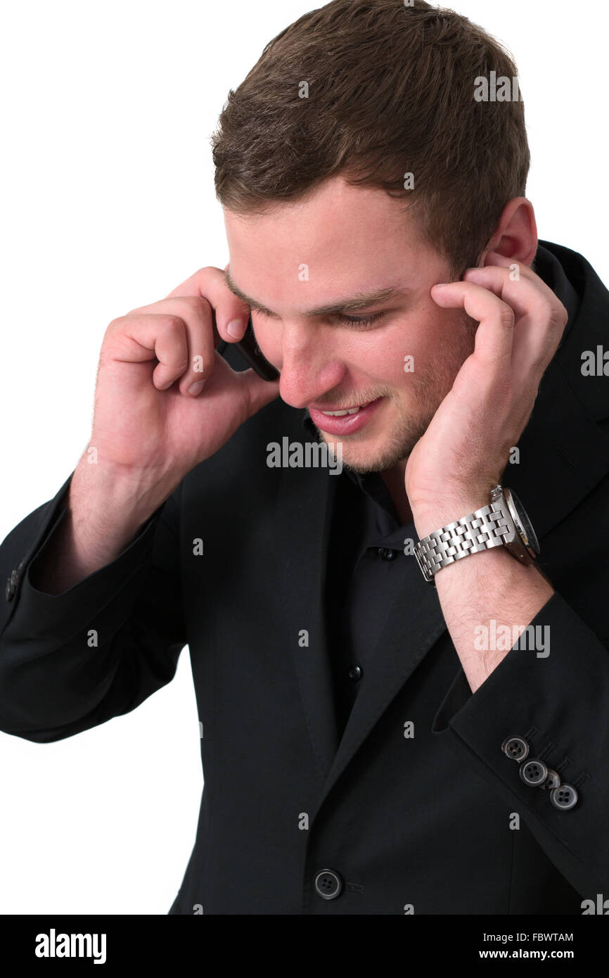 Young Man in jacket talking on the phone Stock Photo