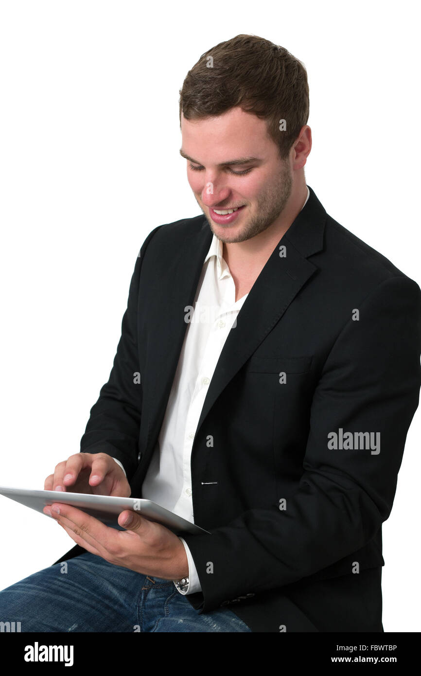 Young Businessman working on a tablet pc Stock Photo