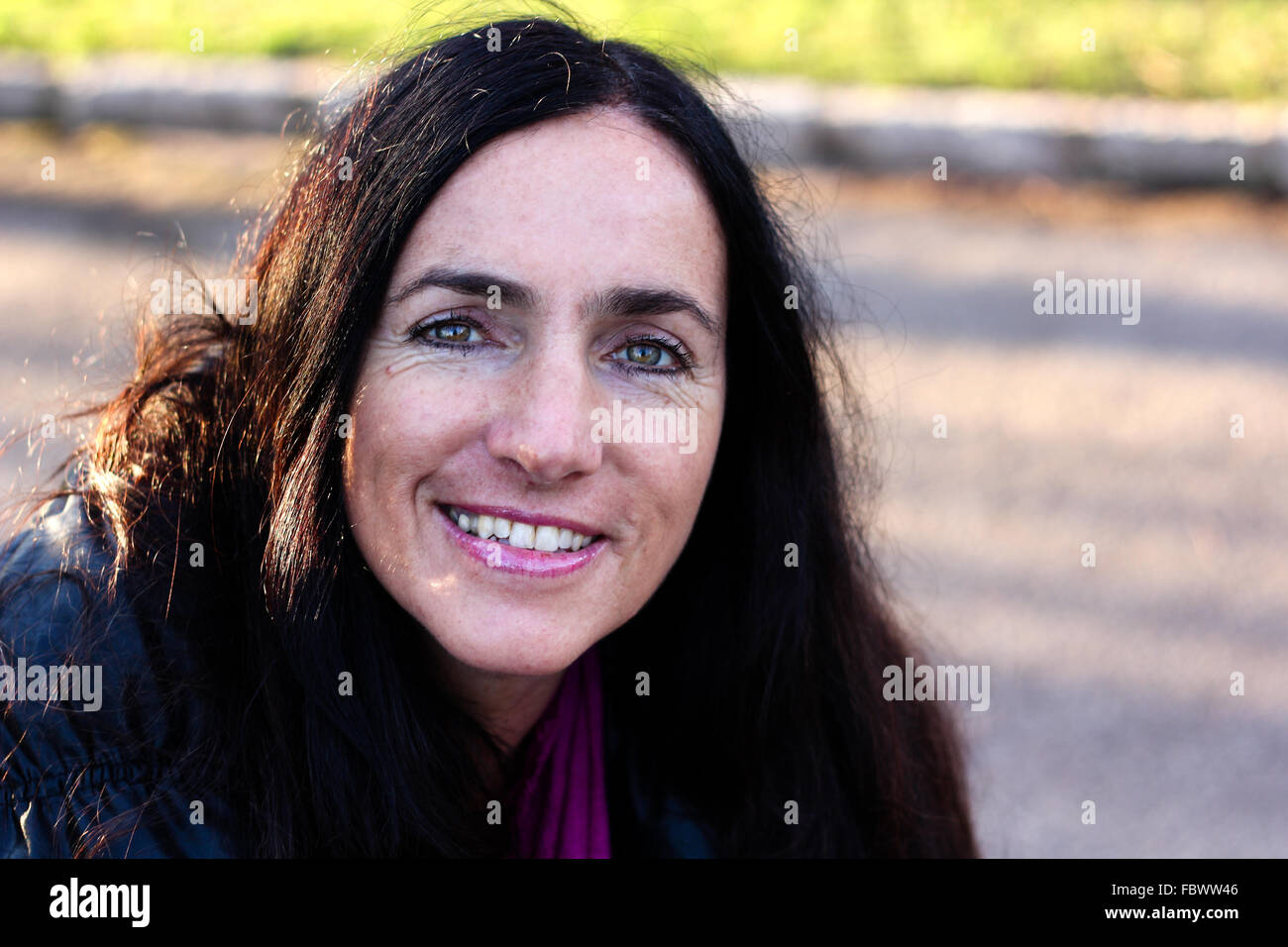 Dark haired beautiful woman hi-res stock photography and images - Alamy