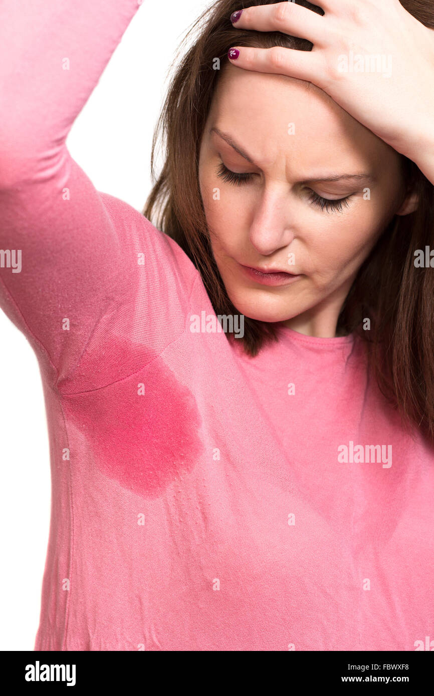 Woman sweating very badly under armpit Stock Photo