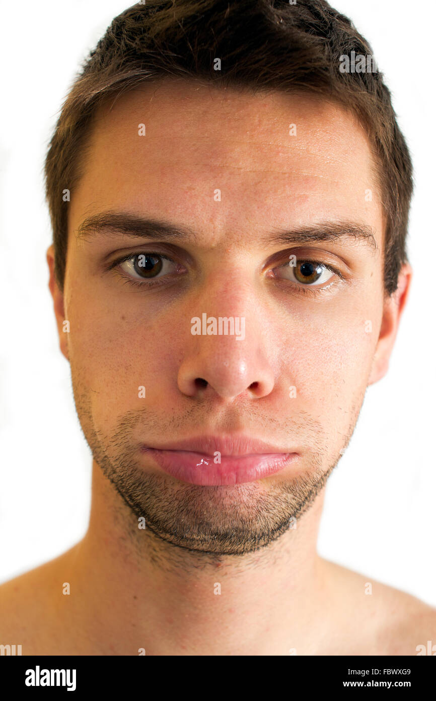 Man doing expression and blowing up lips Stock Photo