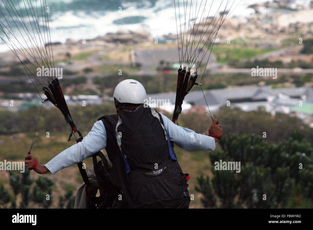 A Paraglider Flying Stock Photo