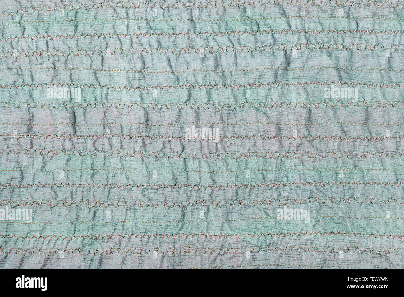 textile background - handmade stitched green fabric Stock Photo