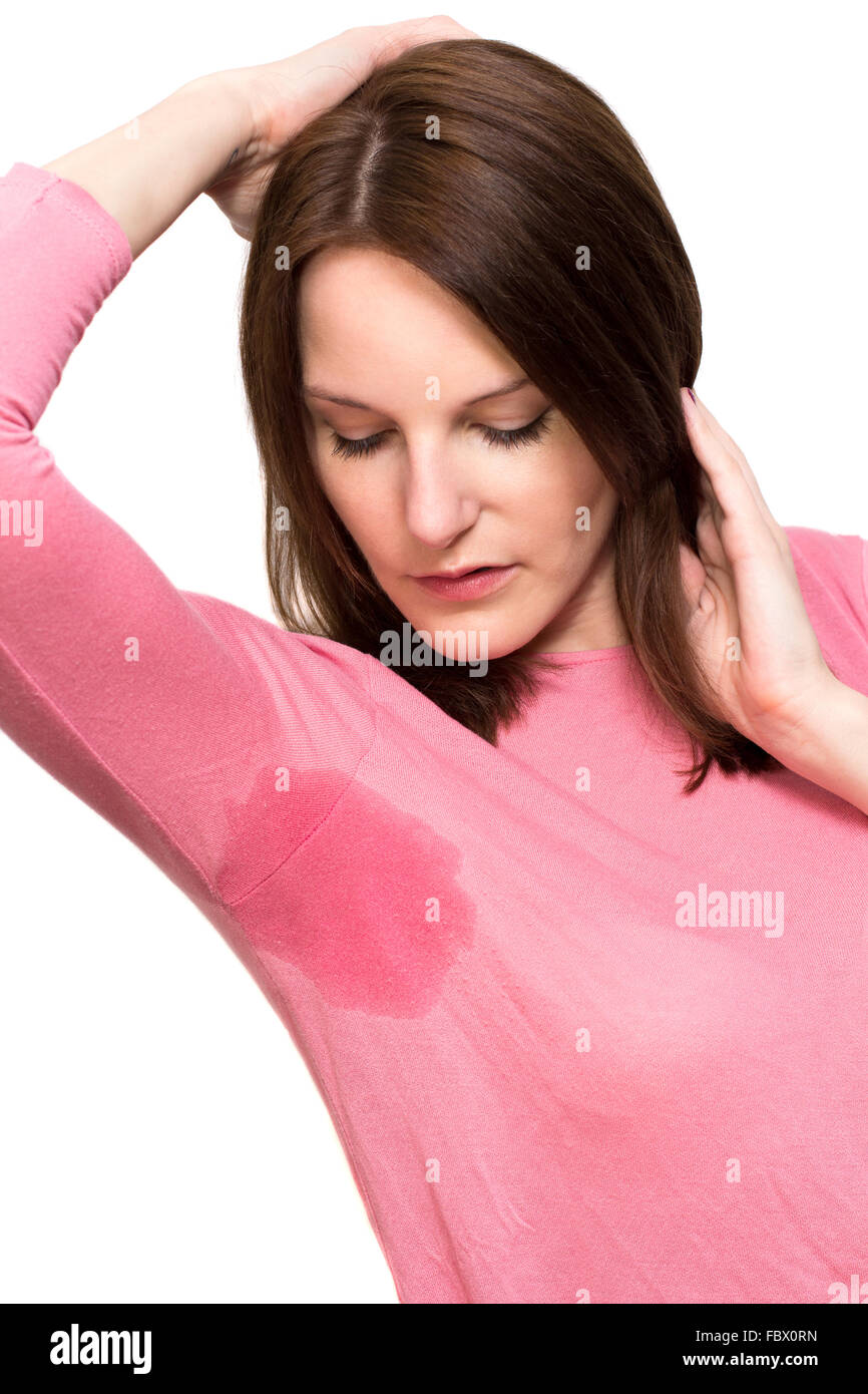 Woman sweating very badly under armpit Stock Photo