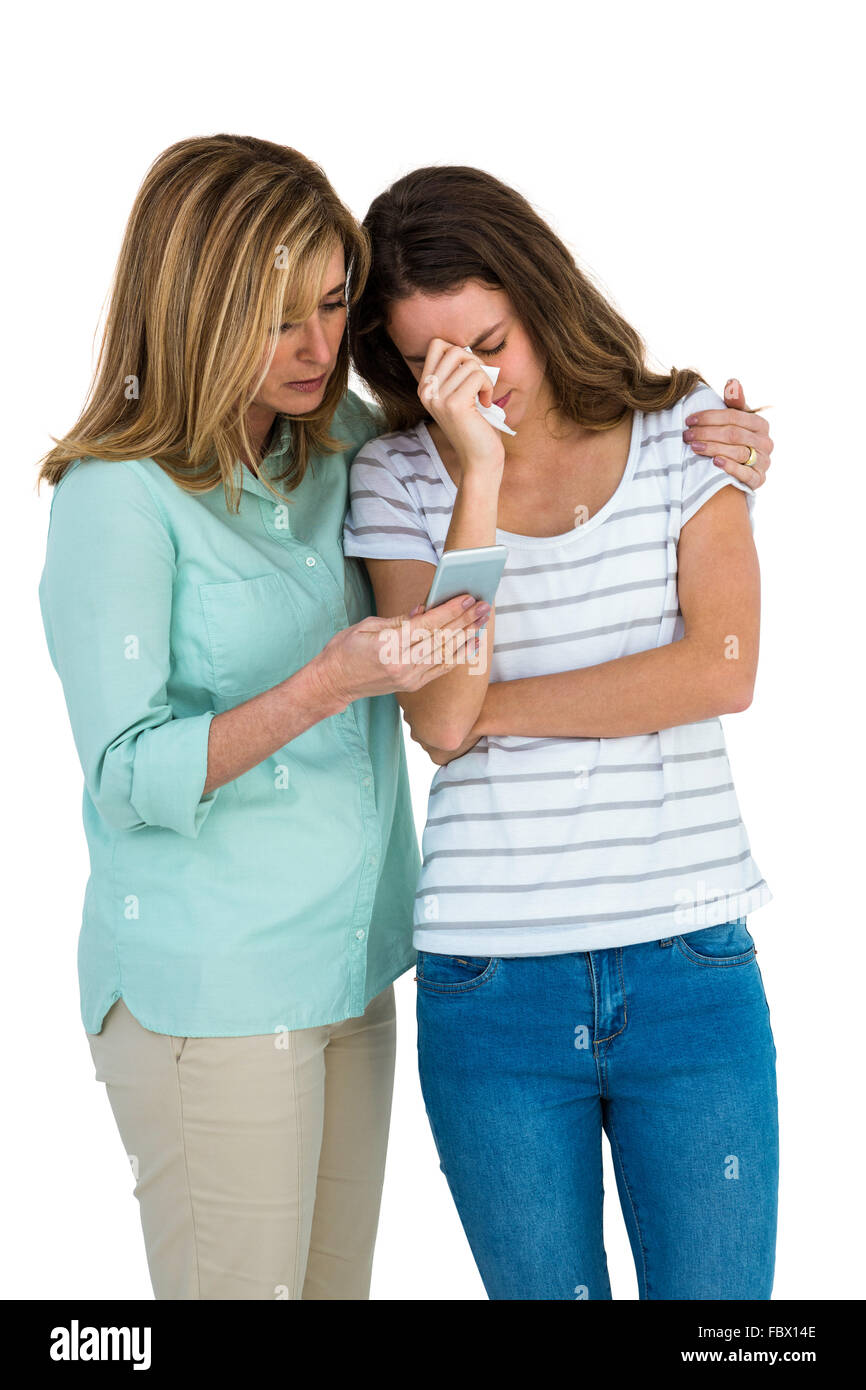 Mother comforting her daughter Stock Photo